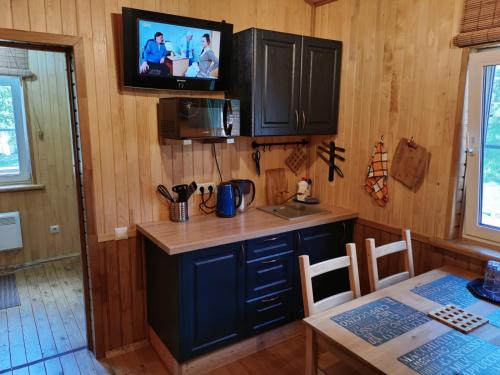 Kitchen, Мини дом с банеи. in Novyye Yel'tsy Kitchen, Мини дом с банеи. in Novyye Yel'tsy