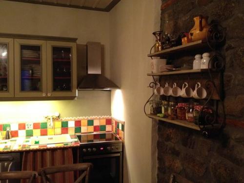 Kitchen, Δαφνη 1933, Λιθοχτιστο Αρχοντικο στο Βουνο in Ano Chora (Aitolia kai Akarnania) Kitchen, Δαφνη 1933, Λιθοχτιστο Αρχοντικο στο Βουνο in Ano Chora (Aitolia kai Akarnania)