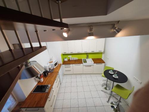 Kitchen, les marmottes in Les Molieres (Ile-de-France) Kitchen, les marmottes in Les Molieres (Ile-de-France)