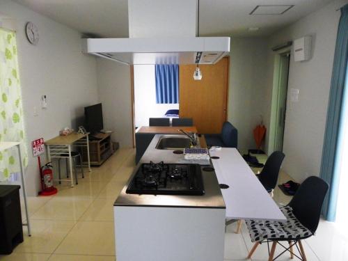 Kitchen, Guest House Miyakojima in Yonaha Beach Kitchen, Guest House Miyakojima in Yonaha Beach