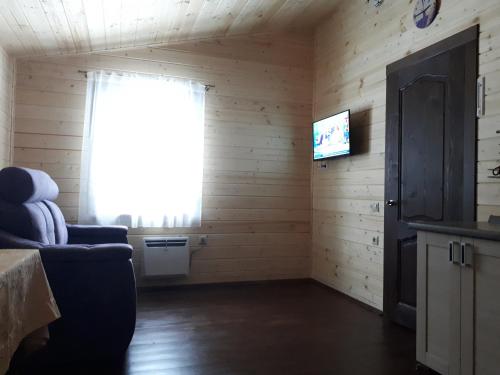 Shared lounge/TV area, КАТРУСИНы ДОМа in Kalyazin Shared lounge/TV area, КАТРУСИНы ДОМа in Kalyazin