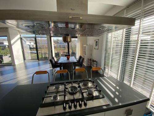 Kitchen, Holiday Home in Harderwijk near Serene Lake in Zeewolde Kitchen, Holiday Home in Harderwijk near Serene Lake in Zeewolde