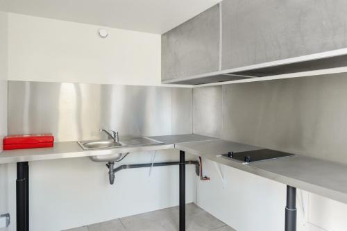 Kitchen, PREMIERE CLASSE PARIS NORD - Sarcelles in Sarcelles Kitchen, PREMIERE CLASSE PARIS NORD - Sarcelles in Sarcelles