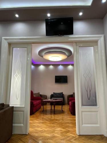 Shared lounge/TV area, Szechenyi Apartman (IV Deluxe) Miskolc belvarosaban in Miskolc Shared lounge/TV area, Szechenyi Apartman (IV Deluxe) Miskolc belvarosaban in Miskolc