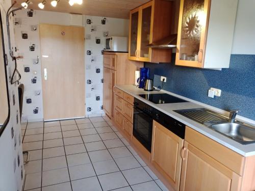 Kitchen, Cozy Apartment in Leudersdorf Eifel with Terrace in Uxheim Kitchen, Cozy Apartment in Leudersdorf Eifel with Terrace in Uxheim