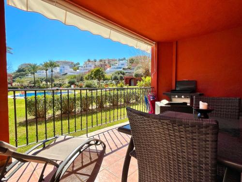 Erkély/terasz, Pool View GOLF FAMILY Ground Floor Terrace with barbecue in Mijas Costa in Mijas Golf Erkély/terasz, Pool View GOLF FAMILY Ground Floor Terrace with barbecue in Mijas Costa in Mijas Golf