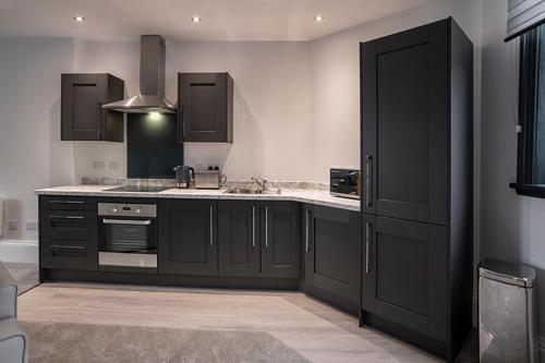 Kitchen, Cavern Quarter apartments by The Castle Collection in Liverpool Kitchen, Cavern Quarter apartments by The Castle Collection in Liverpool