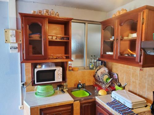Kitchen, Appartement charmant a Sainte-Rose - 70m² avec terrasse in Sainte Rose Kitchen, Appartement charmant a Sainte-Rose - 70m² avec terrasse in Sainte Rose