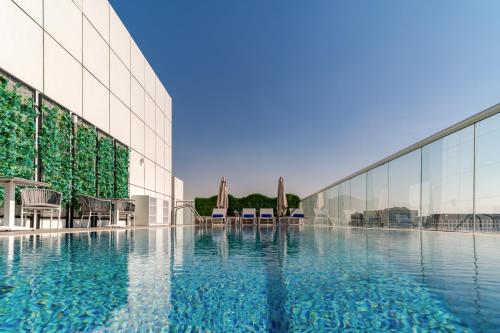 Swimming pool, Studio M Al Barsha Hotel by Millennium in Al Barsha Swimming pool, Studio M Al Barsha Hotel by Millennium in Al Barsha