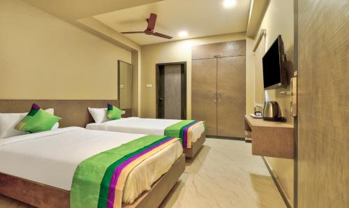 Treebo Sriz Cozy Seethamadhara in Balayya Sastri Layout Treebo Sriz Cozy Seethamadhara in Balayya Sastri Layout