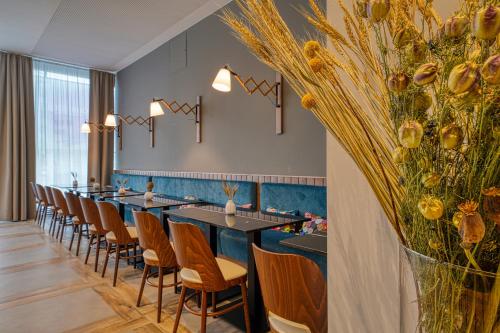 مطعم, Vienna House Easy by Wyndham Freiburg in فريبابج إم بريسجاو مطعم, Vienna House Easy by Wyndham Freiburg in فريبابج إم بريسجاو