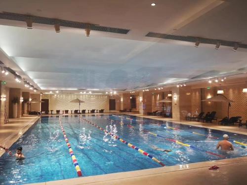 Swimming pool, Sunshine Travelers Business Apartment in Yizhuang Swimming pool, Sunshine Travelers Business Apartment in Yizhuang