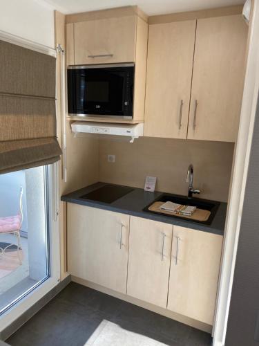 廚房, Charmant studio à Haguenau, à 25mn de Strasbourg (Charmant studio a Haguenau, a 25mn de Strasbourg) in 阿蓋諾 廚房, Charmant studio à Haguenau, à 25mn de Strasbourg (Charmant studio a Haguenau, a 25mn de Strasbourg) in 阿蓋諾