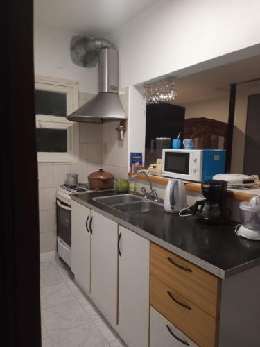 Kitchen, Departamento NALU-RUMU in Mar Del Plata City Center Kitchen, Departamento NALU-RUMU in Mar Del Plata City Center