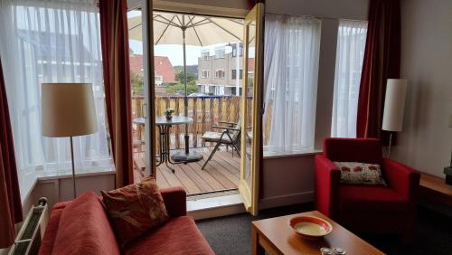 Balcony/terrace, Appartementen de Strandloper in Bergen Balcony/terrace, Appartementen de Strandloper in Bergen