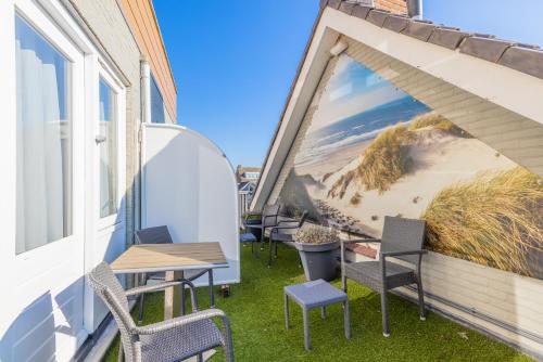 Балкон/тераса, Hotel De Koningshof in Ноордвик Балкон/тераса, Hotel De Koningshof in Ноордвик