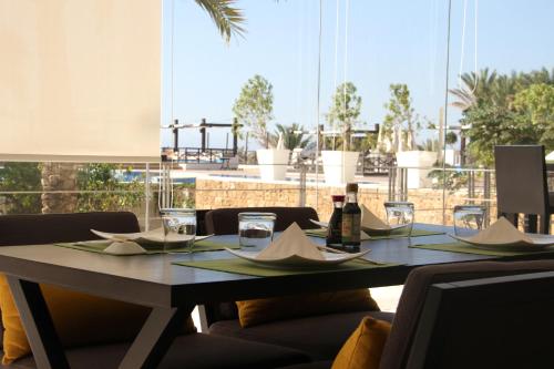 مطعم, بانجيا بيتش ريزورت (Pangea Beach Resort) in الجية مطعم, بانجيا بيتش ريزورت (Pangea Beach Resort) in الجية