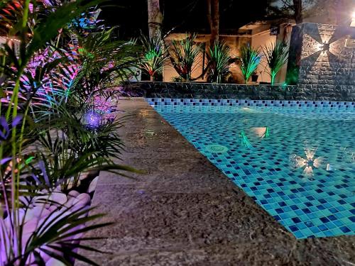 Swimming pool, Tc theme park Guest house near Teluk Cempedak Beach Swimming pool, Tc theme park Guest house near Teluk Cempedak Beach