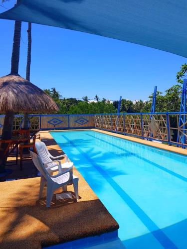 Rainbow Bay Beach & Dive Resort in Siquijor Rainbow Bay Beach & Dive Resort in Siquijor