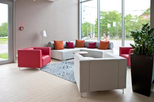 ห้องส่วนกลางสำหรับนั่งเล่น/ดูทีวี, โรงแรมกัมปานีเล วรอเคราว์ เซ็นทรุม (Campanile Hotel Wroclaw Centrum) in โรคลอว์ ห้องส่วนกลางสำหรับนั่งเล่น/ดูทีวี, โรงแรมกัมปานีเล วรอเคราว์ เซ็นทรุม (Campanile Hotel Wroclaw Centrum) in โรคลอว์