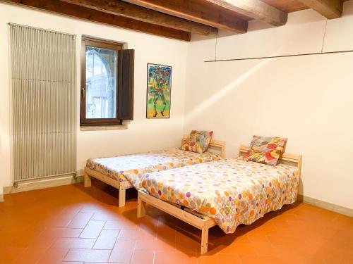 Camera, Casa Vacanze di Arlecchino in San Giovanni Bianco Camera, Casa Vacanze di Arlecchino in San Giovanni Bianco