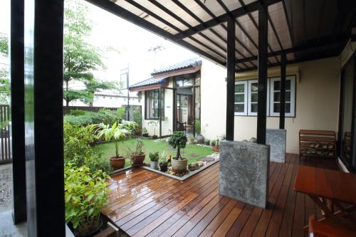 This photo about Mon Lodge & Yoga Donmueang shared on HyHotel.com