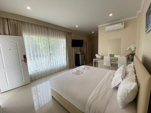 Guestroom, Siri Ville Hotel in Sisaket Guestroom, Siri Ville Hotel in Sisaket