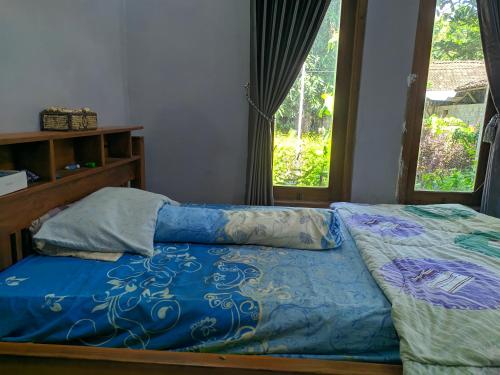 HOMESTAY MBAH POMO SRIHARJO in Karang Tengah HOMESTAY MBAH POMO SRIHARJO in Karang Tengah