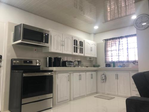 Konyha, JEANOEL Chateau Cozy 2beds 1bath apartment in San Fernando Konyha, JEANOEL Chateau Cozy 2beds 1bath apartment in San Fernando