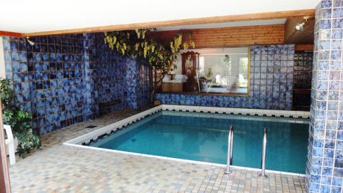 Плувен басейн, Bergsteiger-Zimmer Pension Obermair in Майрхофен Плувен басейн, Bergsteiger-Zimmer Pension Obermair in Майрхофен