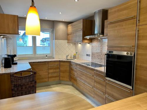 Kitchen, JUNIPRO Apartments Haustadt in Beckingen Kitchen, JUNIPRO Apartments Haustadt in Beckingen