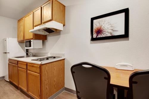 Kitchen, WoodSpring Suites Houston Willowbrook in Willowbrook Kitchen, WoodSpring Suites Houston Willowbrook in Willowbrook