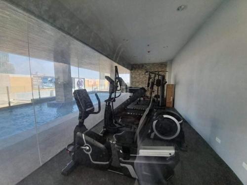 Fitness center, Sunvida Condo across SM City Cebu w/ WIFI and View near SM City Cebu Fitness center, Sunvida Condo across SM City Cebu w/ WIFI and View near SM City Cebu