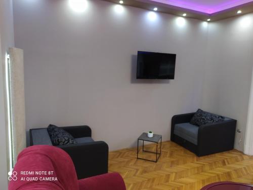 Shared lounge/TV area, Szechenyi Apartman (IV Deluxe) Miskolc belvarosaban in Miskolc Shared lounge/TV area, Szechenyi Apartman (IV Deluxe) Miskolc belvarosaban in Miskolc