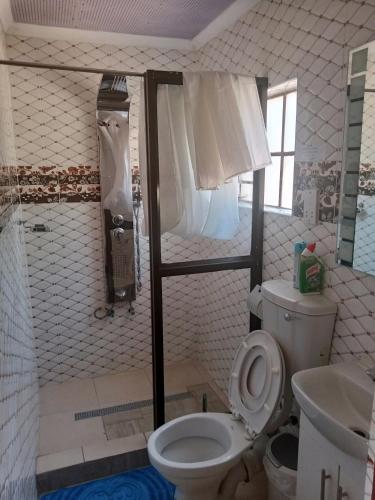 Shower, Impovu Guest house in Kasane Shower, Impovu Guest house in Kasane