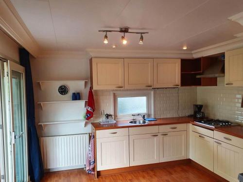 Kjøkken, Spacious chalet with garden in Garderen in Andre Kjøkken, Spacious chalet with garden in Garderen in Andre