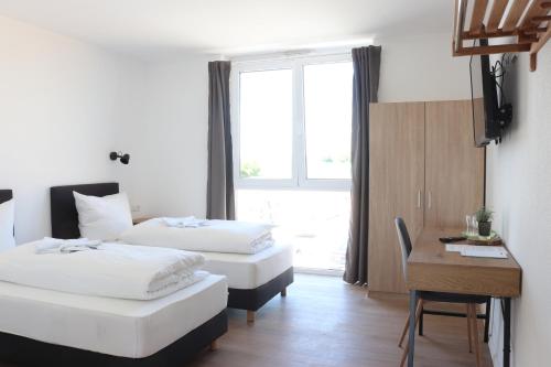 Ágy, Motel Bergtheim - Self Check-in in Hausen bei Wurzburg Ágy, Motel Bergtheim - Self Check-in in Hausen bei Wurzburg