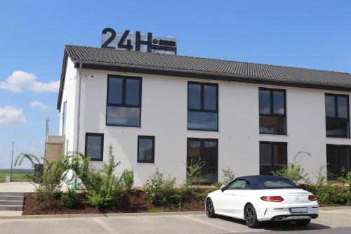A szálláshely kívülről, Motel Bergtheim - Self Check-in in Hausen bei Wurzburg A szálláshely kívülről, Motel Bergtheim - Self Check-in in Hausen bei Wurzburg