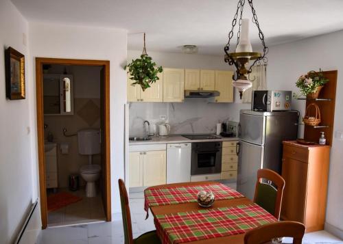 Konyha, Apartments with parking spaces Postira, Brac - 19452 in Postira Konyha, Apartments with parking spaces Postira, Brac - 19452 in Postira