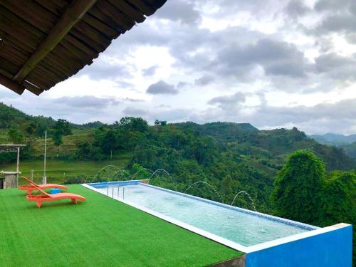 Swimming pool, Captain’s Villa and Campsite in Bacayan Swimming pool, Captain’s Villa and Campsite in Bacayan