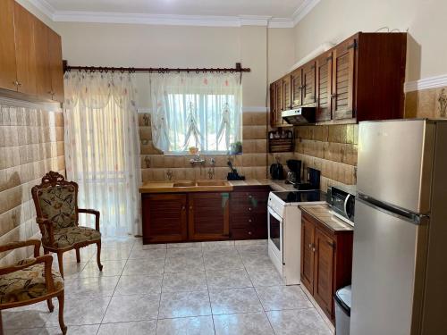 Kitchen, Orange Country House in Mousoures Kitchen, Orange Country House in Mousoures