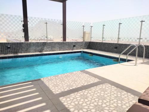 Úszómedence, Nizwa Inn - نزوى إن (Nizwa Inn - نزوى إن) in Nizwa Úszómedence, Nizwa Inn - نزوى إن (Nizwa Inn - نزوى إن) in Nizwa