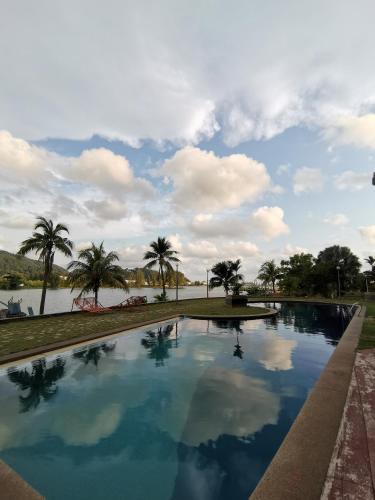 Swimmingpool, Peaceful 1-bedroom unit at Marina Island by JoMy Homestay in Marina Island Swimmingpool, Peaceful 1-bedroom unit at Marina Island by JoMy Homestay in Marina Island