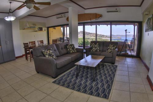 Общая зона отдыха/ТВ, Presidential Suites 4 - Spacious condo in the heart of Flamingo, sleeps 6 in Плайя Фламинго Общая зона отдыха/ТВ, Presidential Suites 4 - Spacious condo in the heart of Flamingo, sleeps 6 in Плайя Фламинго