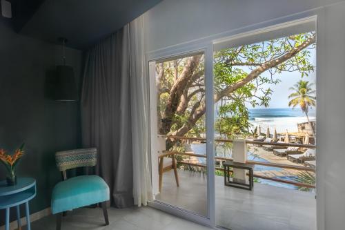 Балкон/тераса, Palo Verde Sustainable Hotel in El Zonte Балкон/тераса, Palo Verde Sustainable Hotel in El Zonte