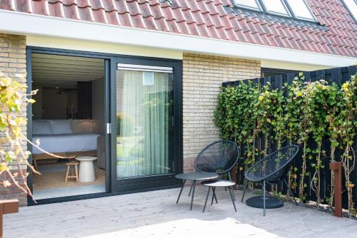 Μπαλκόνι/βεράντα, Van Heeckeren Apartments & Suites Nes in Άμελαντ Μπαλκόνι/βεράντα, Van Heeckeren Apartments & Suites Nes in Άμελαντ