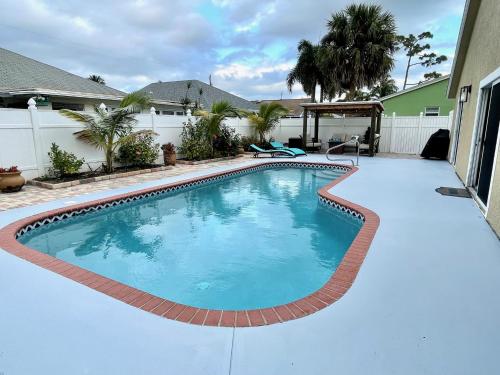 Swimming pool, Perfect Family Vacation House with Private Pool in Jupiter (FL) Swimming pool, Perfect Family Vacation House with Private Pool in Jupiter (FL)