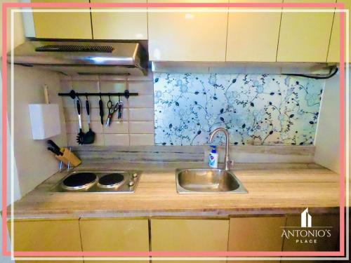 Chic 2BR Loft Unit FREE WIFI & NETFLIX near SM Aura Premier Chic 2BR Loft Unit FREE WIFI & NETFLIX near SM Aura Premier