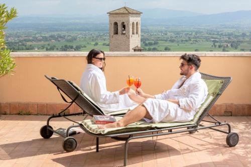 Terraza/balcón, Giotto Hotel & Spa in Eremo delle Carceri Terraza/balcón, Giotto Hotel & Spa in Eremo delle Carceri