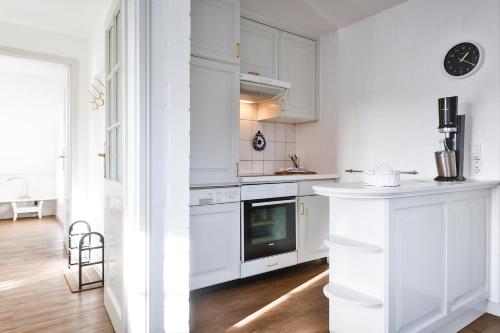 Konyha, Snetjers Hüs Appartement 13 (Snetjers Hus Appartement 13) in Sylt Konyha, Snetjers Hüs Appartement 13 (Snetjers Hus Appartement 13) in Sylt